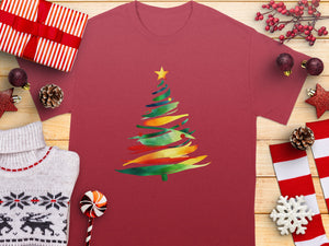 Red t-shirt with a watercolor Christmas tree design and festive holiday decorations.