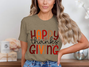 T-shirt with "Happy Thanksgiving" text and a maple leaf design.