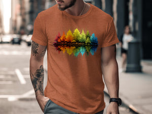 Orange t-shirt with a rainbow forest reflection graphic.