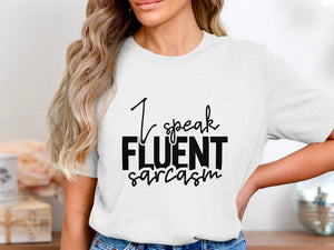 White t-shirt with black text reading "I speak FLUENT sarcasm".
