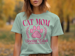 Light green t-shirt with "CAT MOM Social Club" and paw print graphic.