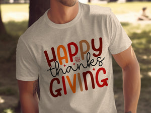 Light grey t-shirt with "Happy Thanksgiving" text in festive colors and fonts.
