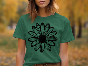 Green t-shirt with a black outline of a daisy graphic on the front.