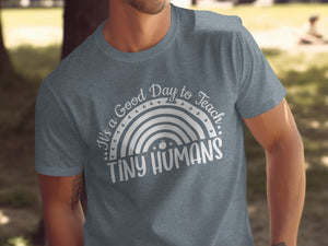 Grey t-shirt with white text "It's a Good Day to Teach Tiny Humans".