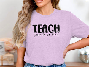 Light purple t-shirt with black "TEACH them to be kind" text