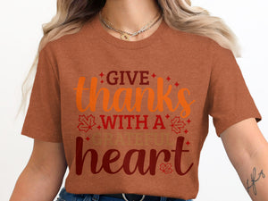 Orange t-shirt with "Give thanks with a grateful heart" text and fall leaf accents.