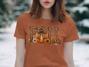 Orange t-shirt with "FALL" text in leopard print, pumpkin, and fall flowers.