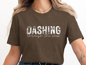 Brown t-shirt with white text that says "DASHING through the snow".