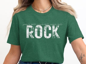 Green t-shirt with white distressed text reading "jingle bells jingle bells jingle bell ROCK".