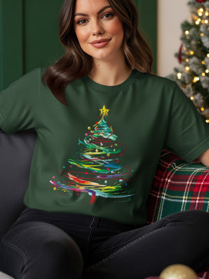 Green t-shirt with colorful abstract Christmas tree and star design.