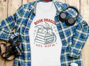 White t-shirt with cartoon dragon and books, reading "Book Dragon" and "not worm".