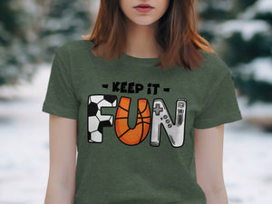 Green t-shirt with "Keep It FUN" design featuring football, basketball, and video game controller letters.