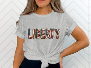 T-shirt with "LIBERTY" text in patriotic American flag design.