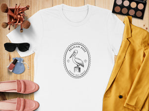 White t-shirt with pelican logo reading "Pelican Post Coastal Mail Service".