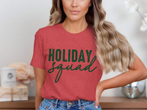 Red t-shirt with green "Holiday Squad" text