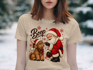 Santa booping a Highland cow wearing a Santa hat with "Boop" text.