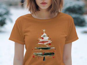 Orange t-shirt with a watercolor Christmas tree design and ornaments.