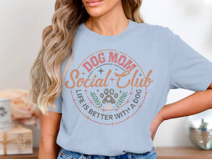 Light blue t-shirt with "Dog Mom Social Club" and paw print graphic.