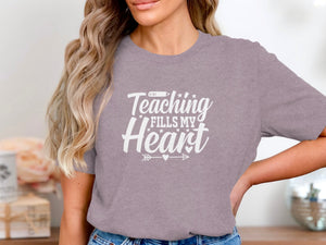 Gray t-shirt with white text stating "Teaching Fills My Heart".