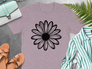 Dusty rose t-shirt with black daisy graphic, mint bag, and sandals.