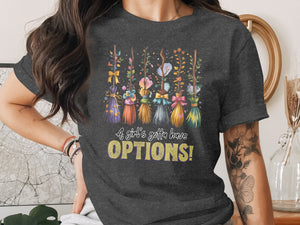 Dark t-shirt with floral brooms and text "A girl's gotta have OPTIONS!".