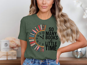 Green t-shirt with a clock graphic made of books, reading "So Many Books So Little Time".