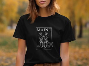 Black t-shirt with white Maine lobster graphic and text: NEW ENGLAND U.S.A.