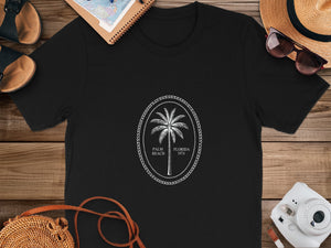 Black t-shirt with a white oval graphic of a palm tree, "Palm Beach Florida 1974".