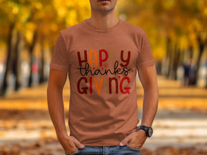 Orange t-shirt with "Happy Thanksgiving" text and a maple leaf graphic.