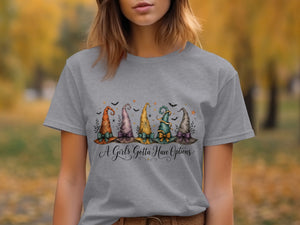 Grey t-shirt with five colorful witch hats and text "A Girls Gotta Have Options".