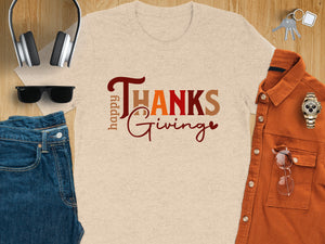 Light tan t-shirt with "Happy Thanksgiving" text and fall colors.