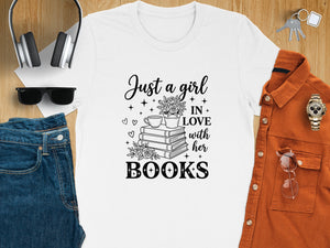 White t-shirt with "Just a girl IN LOVE with her BOOKS" graphic.