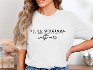 White t-shirt with black text "BE AN ORIGINAL. ORIGINALS ARE ALWAYS worth more."