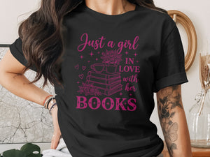 Black t-shirt with pink text: "Just a girl IN LOVE with her BOOKS".