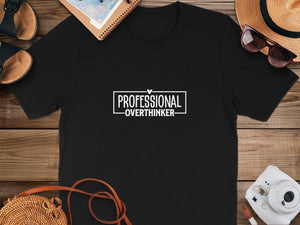 Black t-shirt with white text that reads "PROFESSIONAL-OVERTHINKER-".