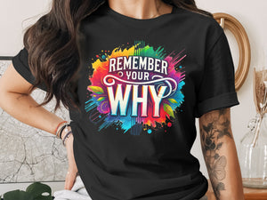 Black t-shirt with colorful "REMEMBER YOUR WHY" graphic and abstract splashes.