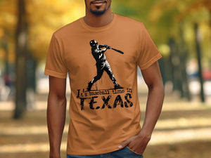 Orange t-shirt with black graphic of a baseball player and text "It's baseball time in TEXAS".
