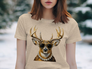 Deer with sunglasses and diamond necklace printed on a tan t-shirt.