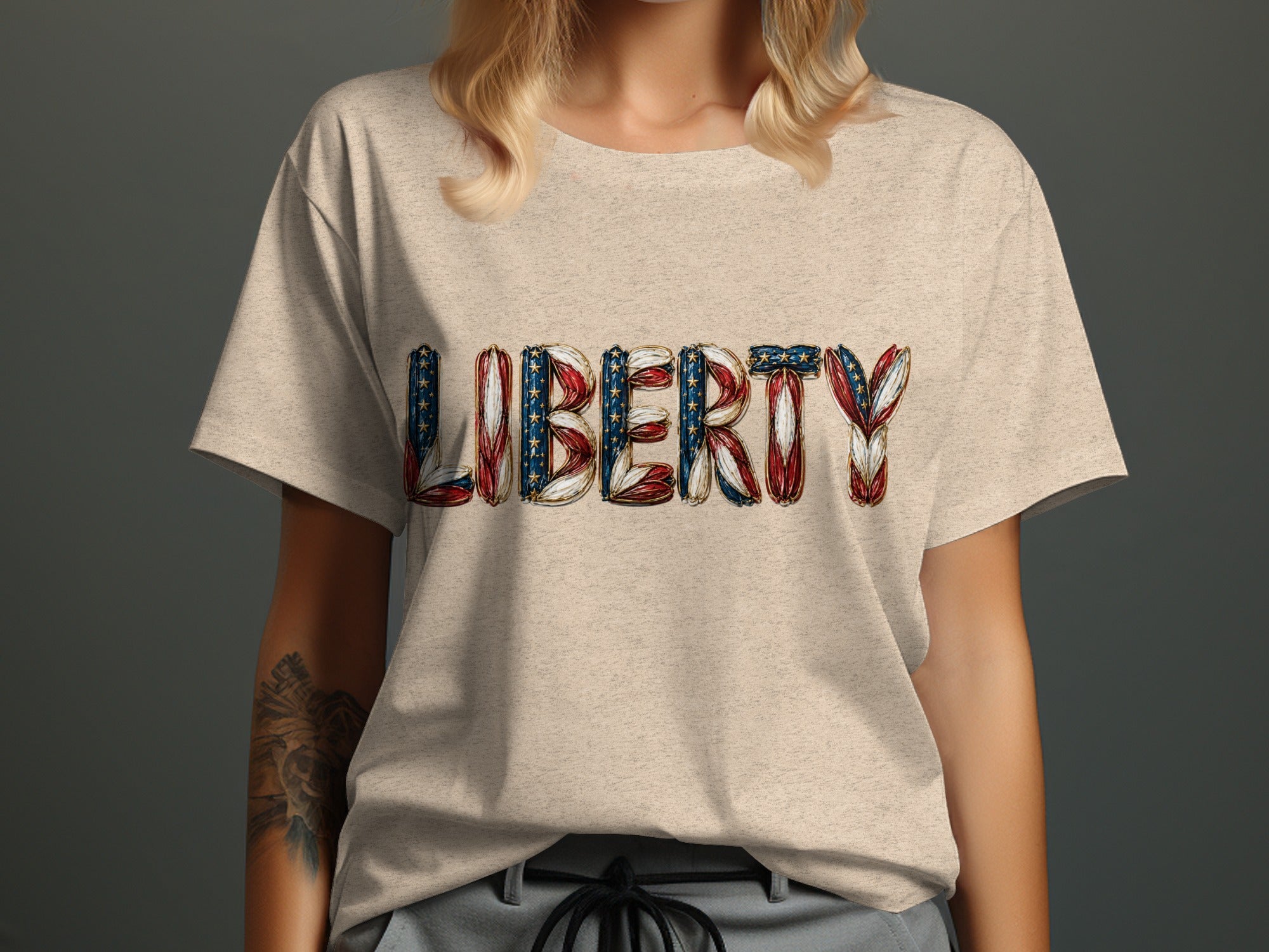 T-shirt with the word LIBERTY in American flag style lettering.