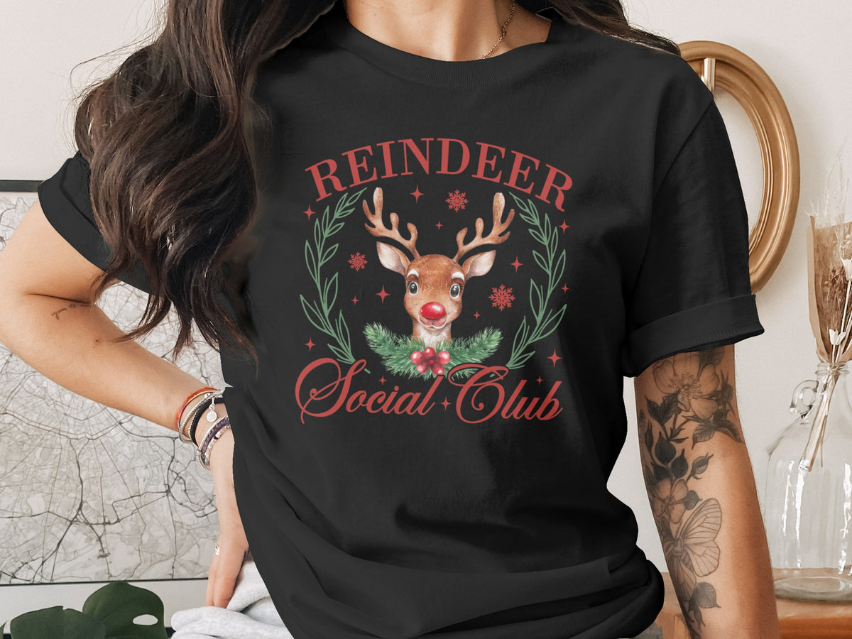 Black t-shirt with "Reindeer Social Club" text and a festive reindeer graphic.