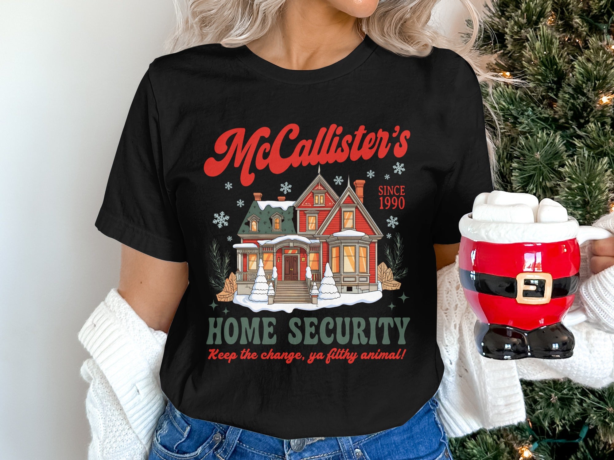 McCallister's Home Security t-shirt with a winter house graphic and quote.