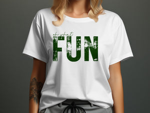 White t-shirt with distressed green text reading "oh what FUN".