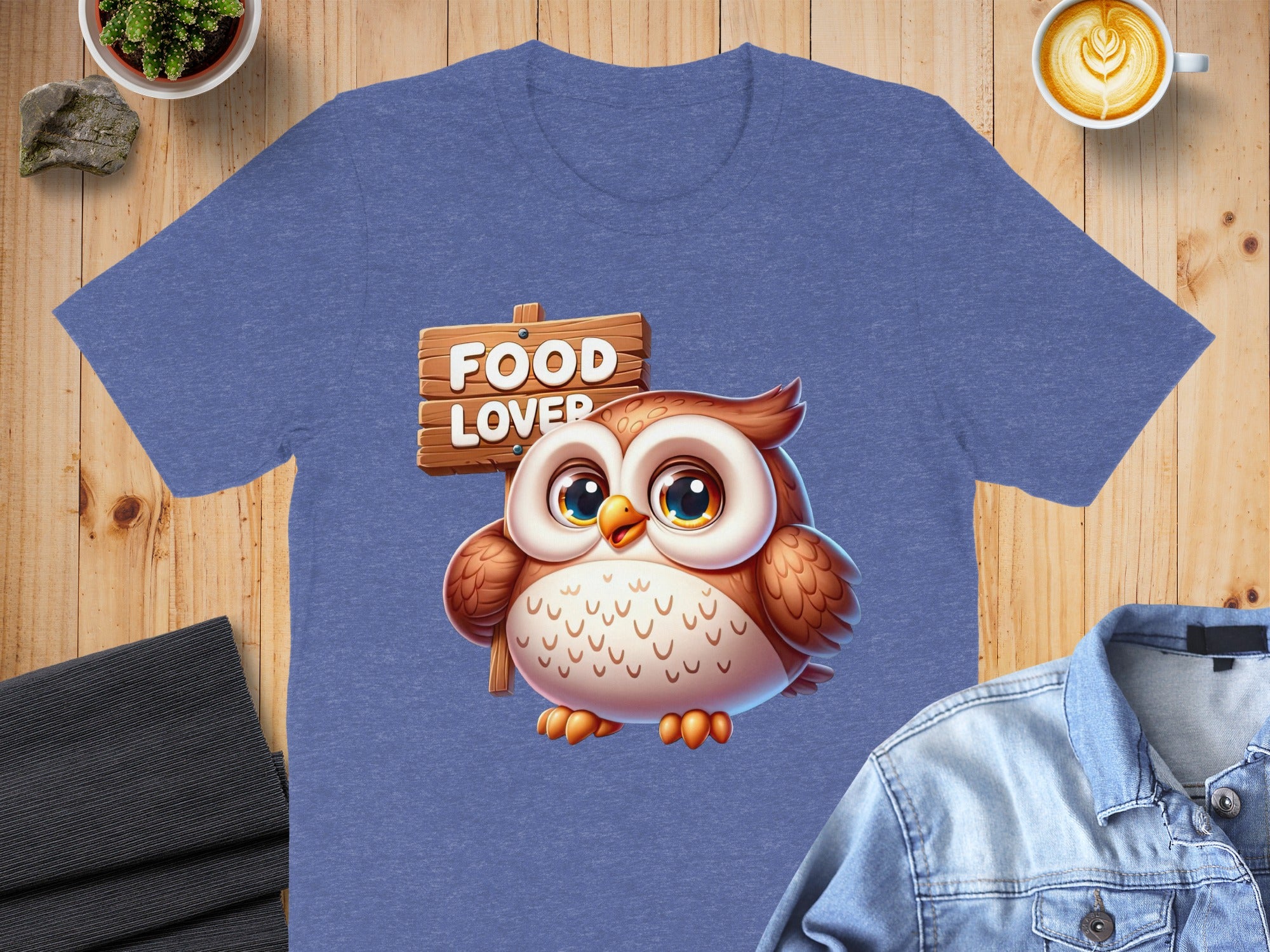 Blue t-shirt with "FOOD LOVER" text on a wooden sign and a cute owl graphic.
