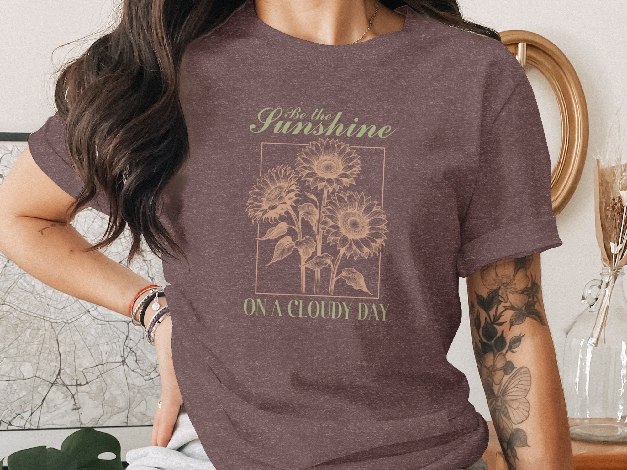 T-shirt with sunflowers and text "Be the Sunshine ON A CLOUDY DAY".