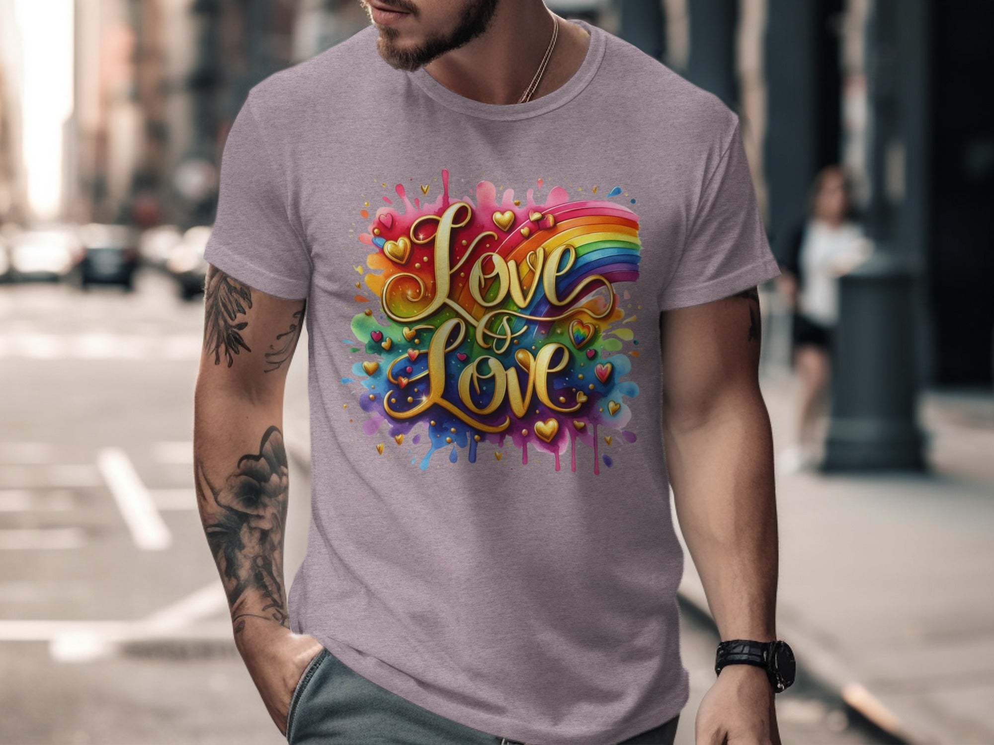 Gray t-shirt with "Love is Love" in gold script, rainbow, and hearts.
