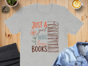 Grey t-shirt with stack of books and "Just a girl who loves books" text.