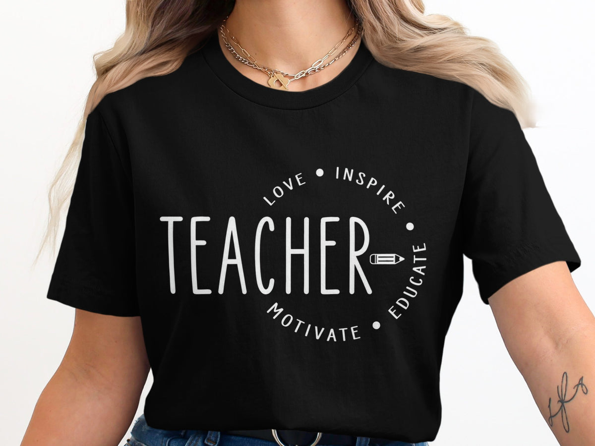 Black t-shirt with white text "TEACHER" surrounded by "LOVE INSPIRE MOTIVATE EDUCATE" and a pencil graphic.