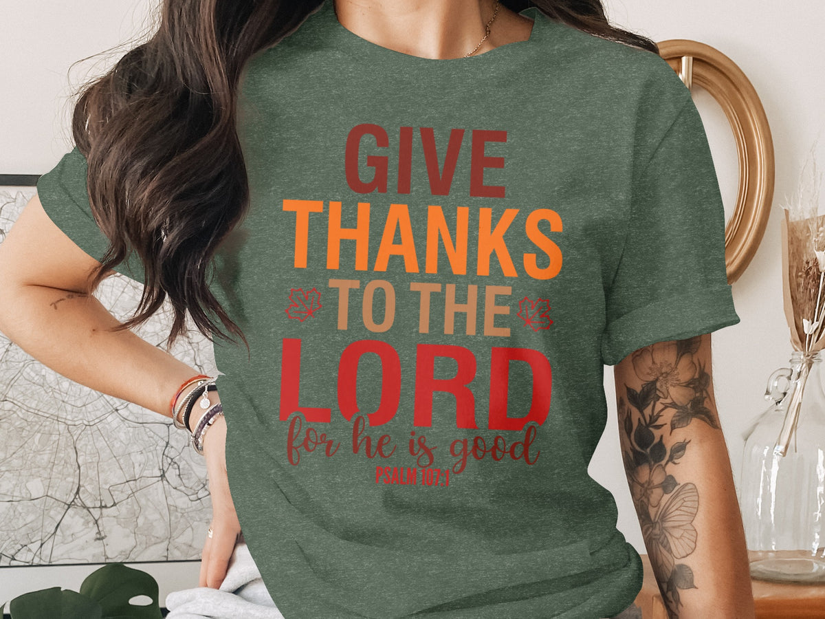 Green t-shirt with text "GIVE THANKS TO THE LORD for he is good"