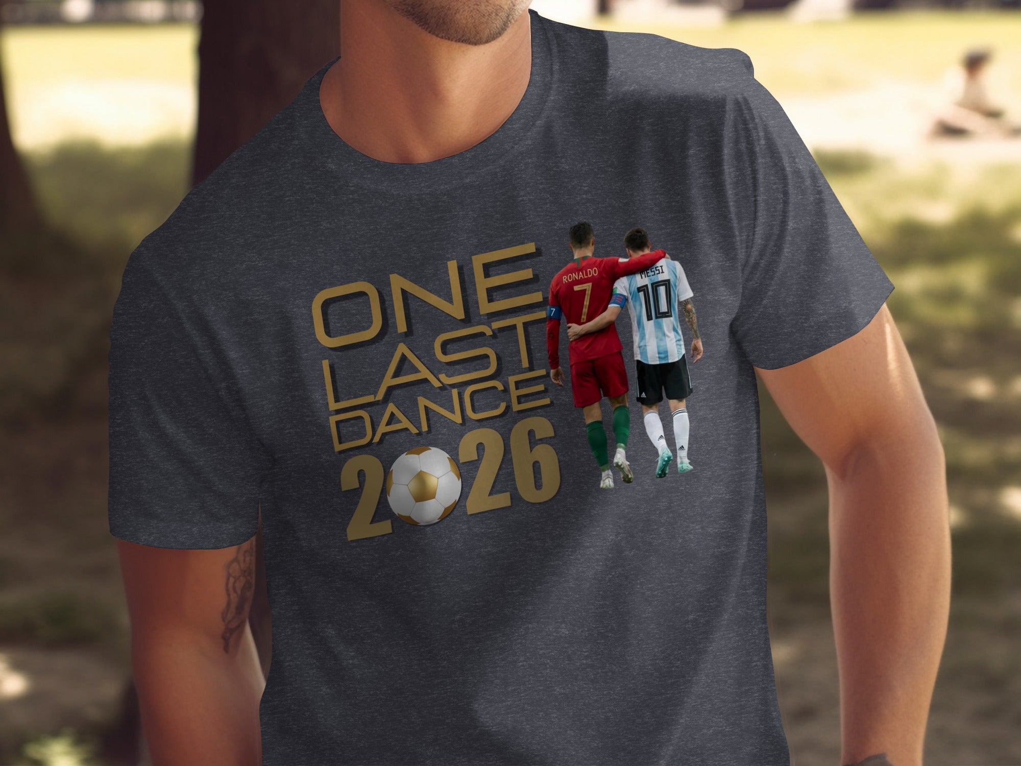 Ronaldo and Messi graphic on a t-shirt with "One Last Dance 2026" text.
