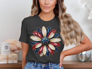 Woman wearing dark t-shirt with patriotic flower graphic featuring stars and stripes.
